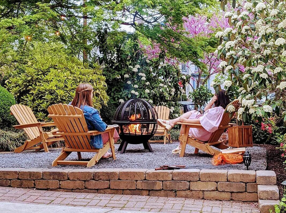 People enjoying a fire pit at PA boutique hotel